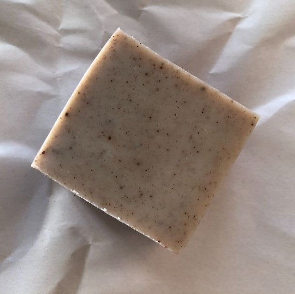 mini body bar soap for eczema on white paper