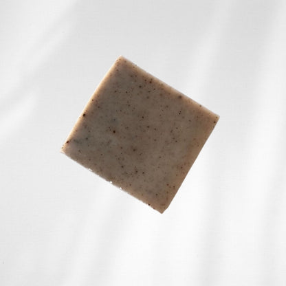 Square bar of soap on a white background