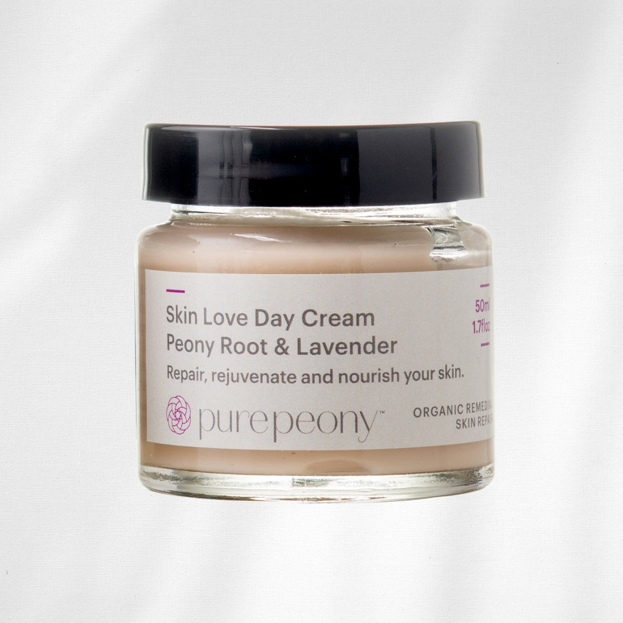 Jar of Skin Love Day Cream with Peony Root & Lavender on a white background