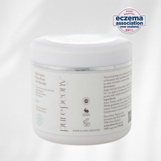 tub of natural pure eczema cream with Eczema Association New Zealand logo on a white background