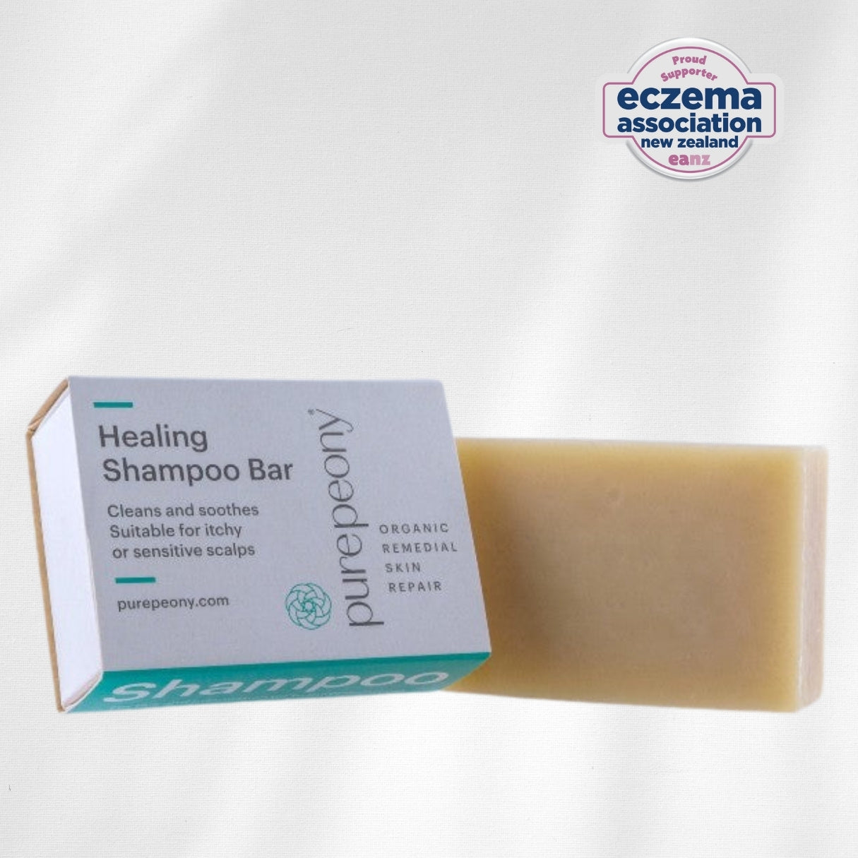 Healing Shampoo Bar from purepeony for itchy scalps with packaging on a white background