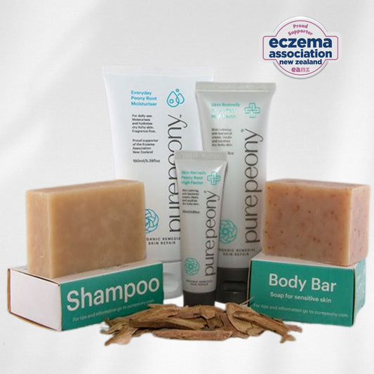 Pure Peony skincare and hair care products with Eczema Association New Zealand logo.